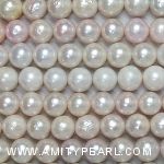 3283 nucleated freshwater pearl strand 9-12mm.jpg